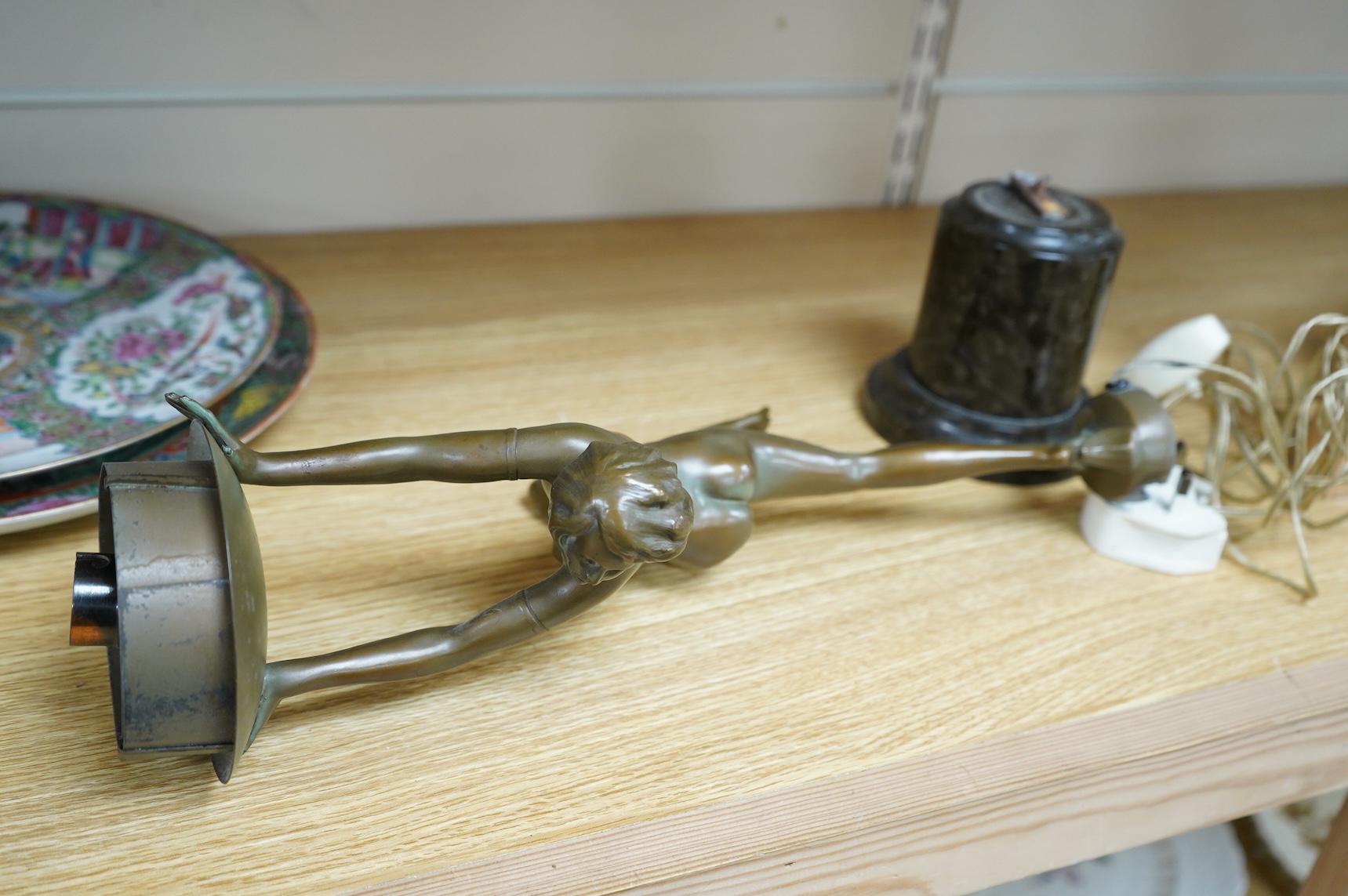 An Art Deco patinated spelter figural lamp, serpentine marble plinth (detached)